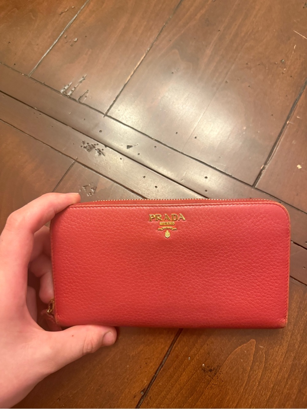 Prada Coral-Red Zip Around Pebbled Leather Wallet with Gold Logo USED